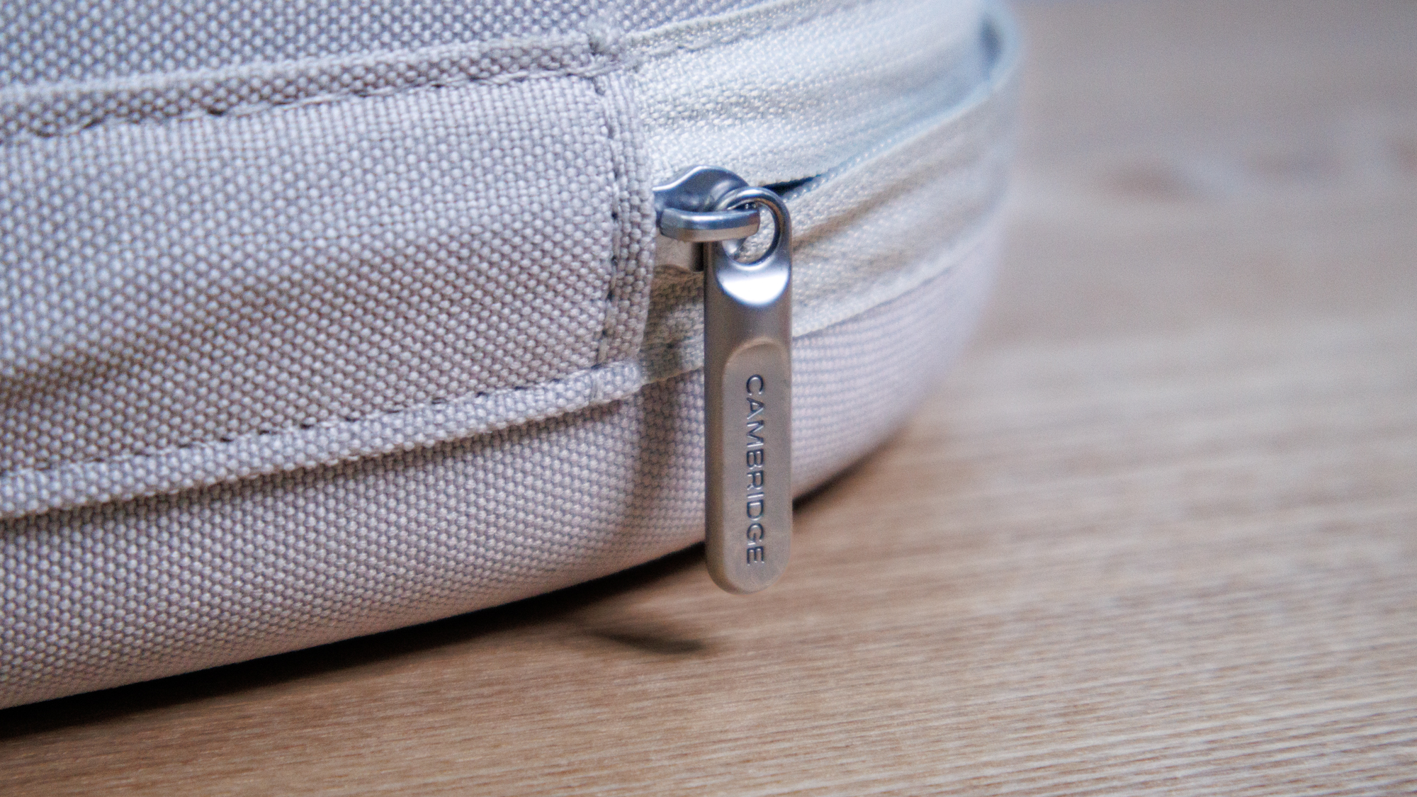 The zip fastener on the Cambridge Audio Melomania P100 SE headphones case.