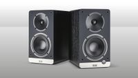 Elac Debut ConneX speakers on grey background