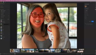 Screengrab of Lightroom interface showing photo of mother holding young girl