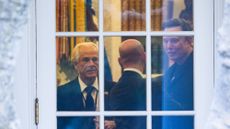 Peter Navarro, Stephen Miller and Elon Musk converse in the Oval Office
