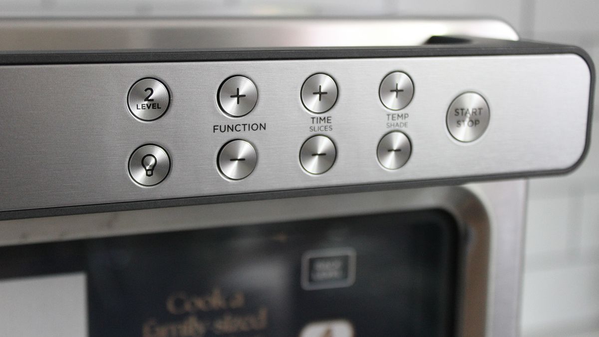 Ninja Prestige Smart XL Air Fryer &amp; Countertop Oven being tested in a white kitchen