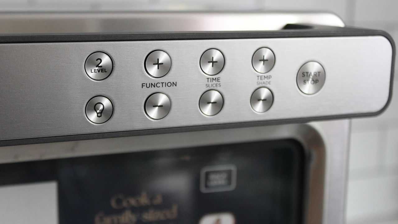 Ninja Prestige Smart XL Air Fryer &amp; Countertop Oven being tested in a white kitchen