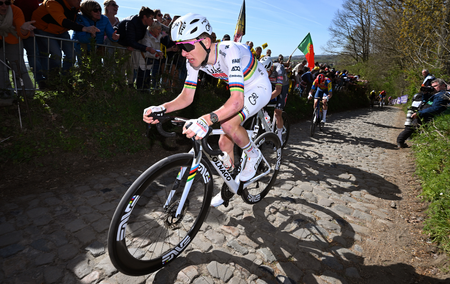 Tadej Pogacar of Slovenia and Team UAE Team Emirates - XRG competes in the chase group competes passing through the Koppenberg cobblestones sector during the 109th Ronde van Vlaanderen - Tour des Flandres 2025 - Men's Elite a 269km one day race from Bruges to Oudenaarde / #UCIWT / on April 06, 2025 in Oudenaarde, Belgium.