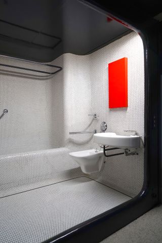 pan wogenscky house interiors in red and monochrome tones