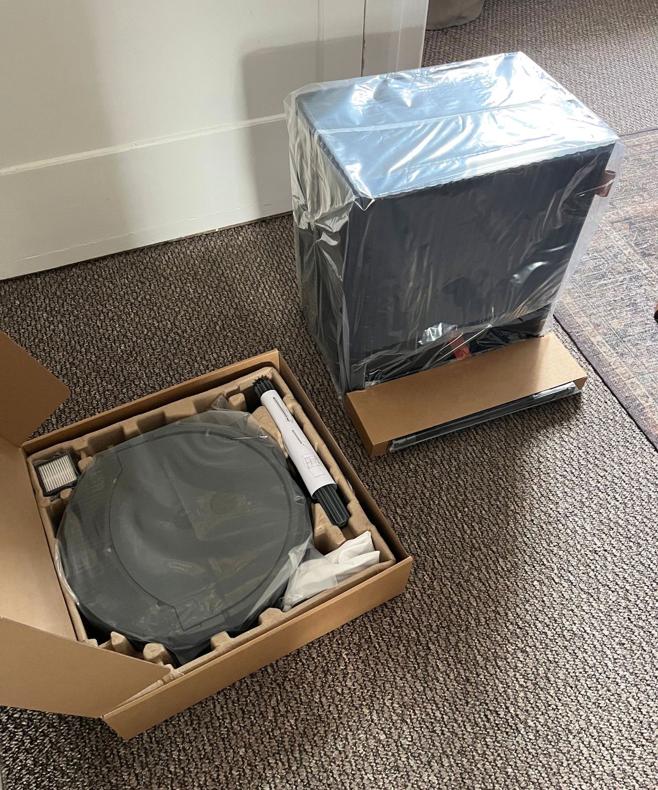 The Roomba Max and AutoWash dock out of the box