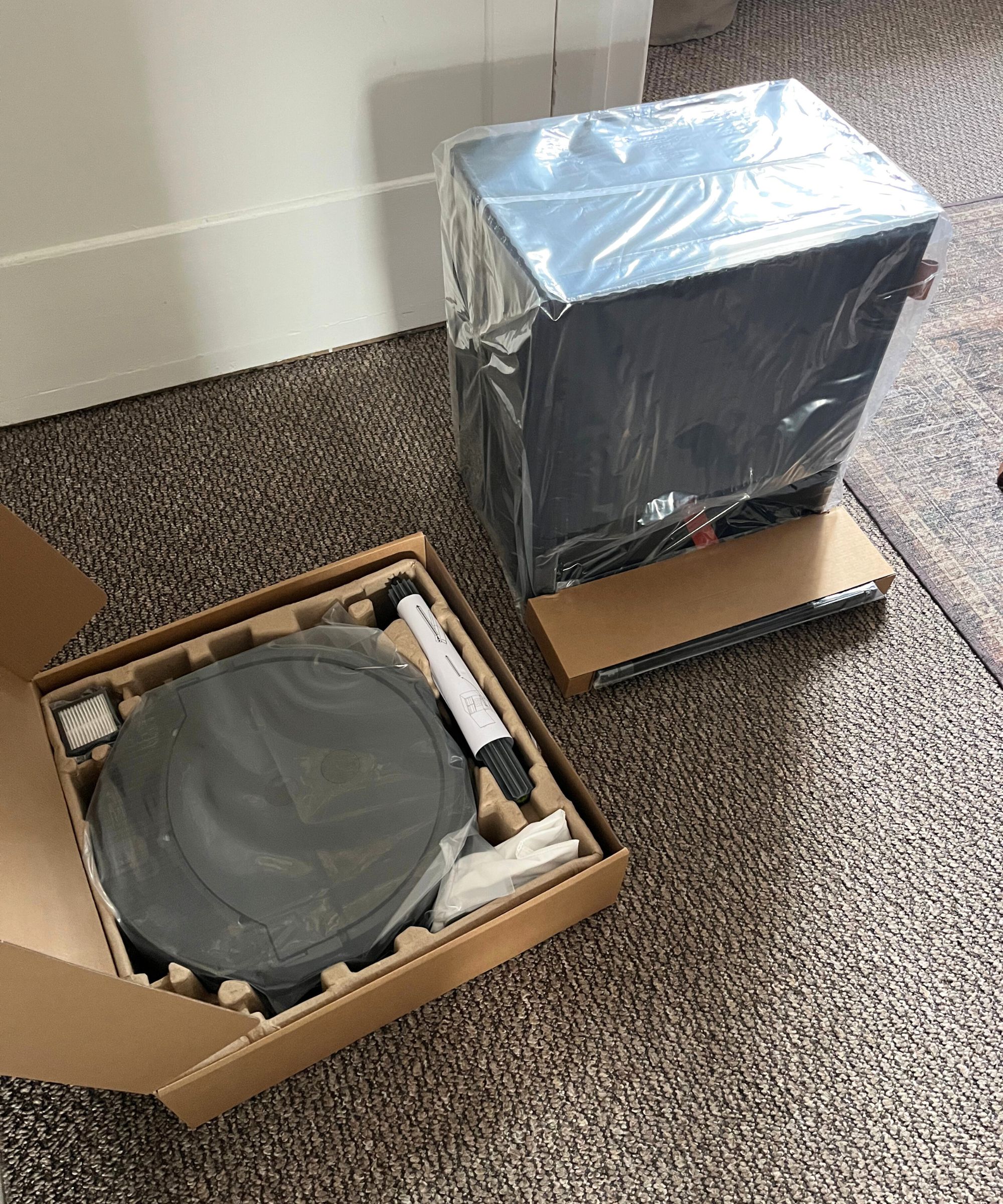 The Roomba Max and AutoWash dock out of the box
