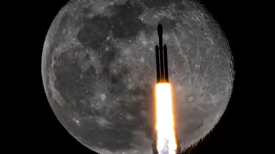 SpaceX Falcon Heavy rocket photobombs the moon in incredible award-winning shot Space