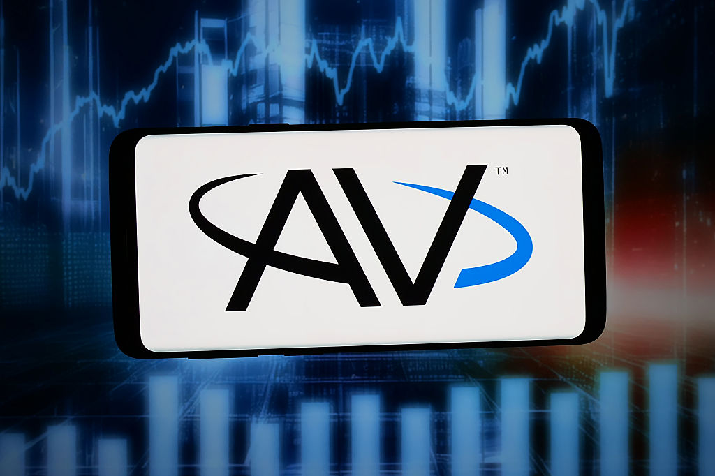 AeroVironment logo displayed on a smartphone in front of abstract background on computer screen