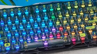 A GravaStar Mercury K1 Lite mechanical keyboard with shine-through keycaps