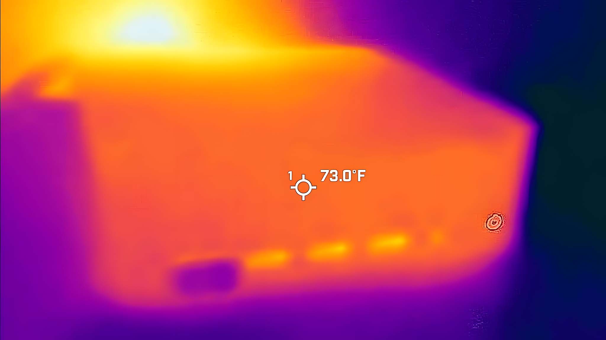 A thermal camera image showing that the front of the Geekom GT1 Mega reaches 73 degrees F. 