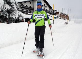 Ivan Basso tries his snow shoes on for size