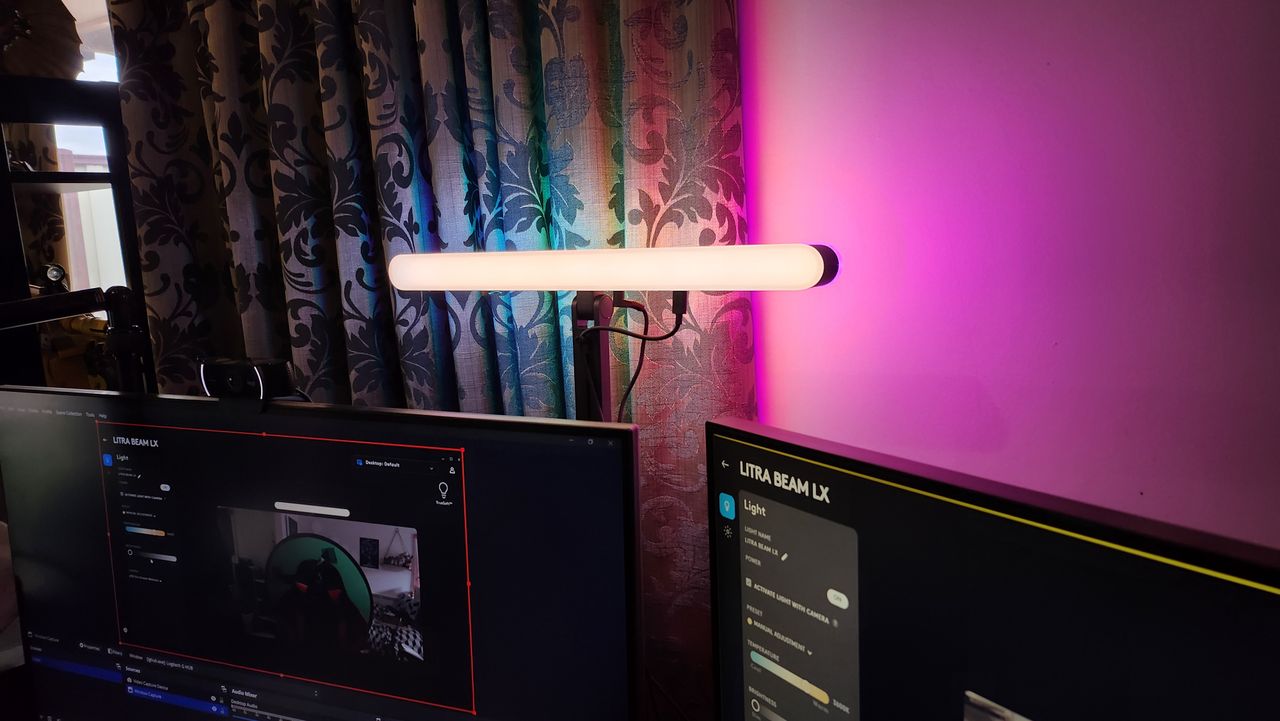 The Logitech Litra Beam LX key light set-up on a desk.