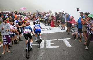 COL DU TOURMALET FRANCE JULY 29 LR Cecilie Uttrup Ludwig of Denmark and Team FDJ SUEZ Ane Santesteban of Spain and Team Jayco AlUla and Marta Cavalli of Italy and Team FDJ SUEZ compete while fans cheer during the 2nd Tour de France Femmes 2023 Stage 7 a 898km stage from Lannemezan to Col du Tourmalet 2116m UCIWWT on July 29 2023 in Col du Tourmalet France Photo by Alex BroadwayGetty Images