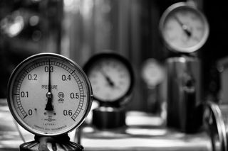 A black and white photo of a barometer taken with the Voigtlander APO-Lanthar 50mm f/3.5 VM Limited lens