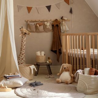 kids room with soft toys and cream wall