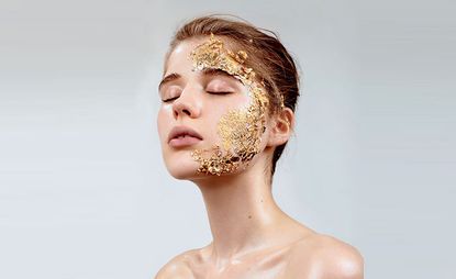 woman with gold foil on the side her face