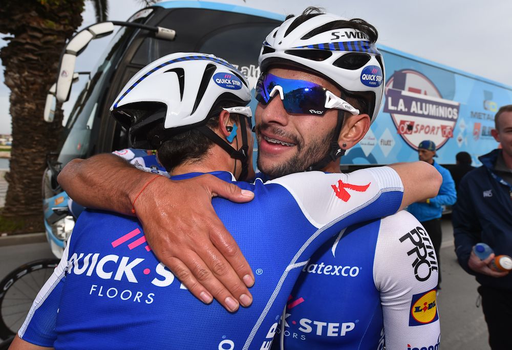Fernando Gaviria celebrates with a teammate after winning stage 1 at the Volta ao Algarve.