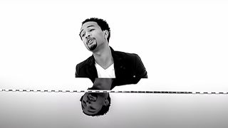 John Legend at the piano in Ordinary People music video