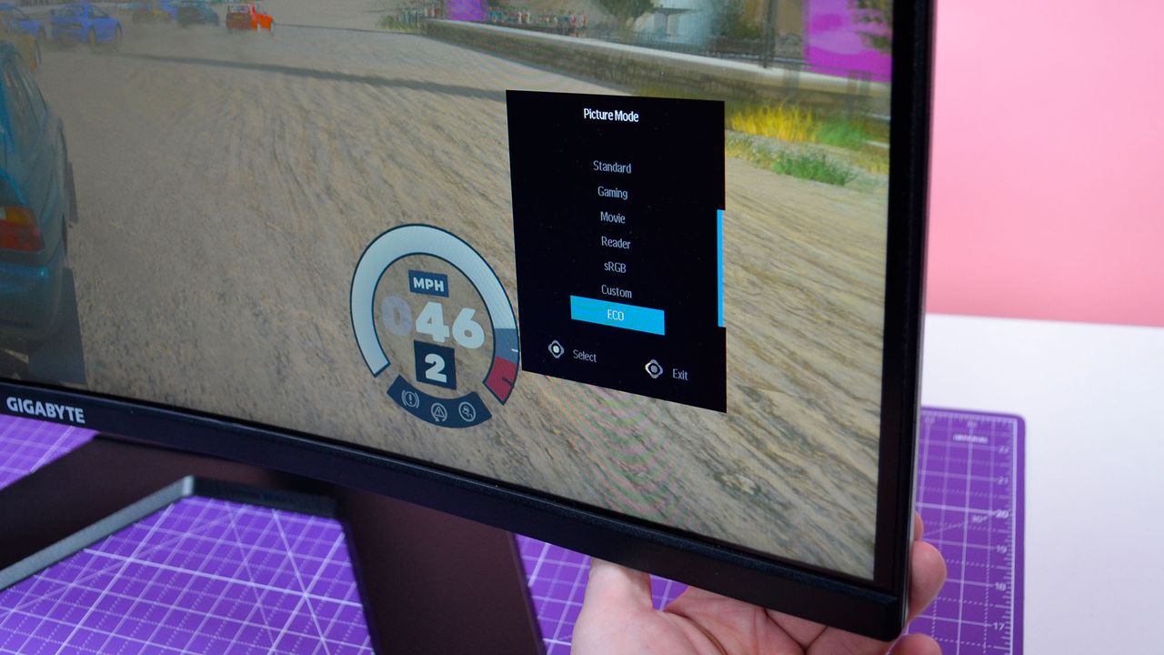 A Gigabyte GS34WQC gaming monitor on a desk