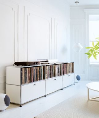 White room with USM Haller vinyl storage unit