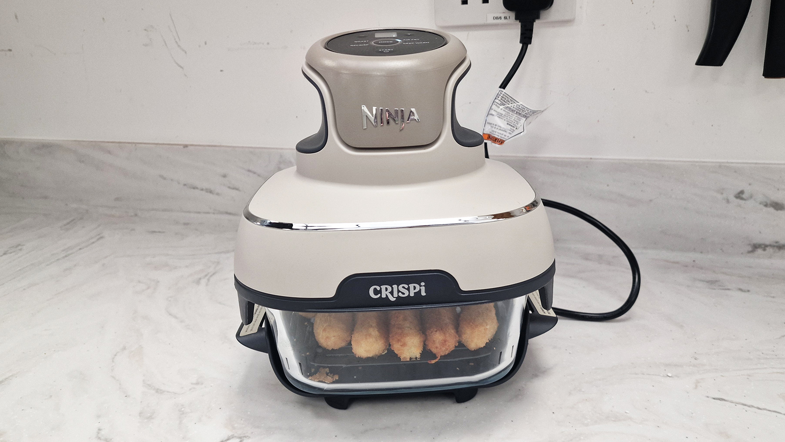 Ninja Crispi air fryer being tested in the Tom&#039;s Guide test kitchen
