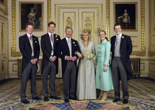 Prince Harry, Prince William, King Charles, Queen camilla, Laura Lopes and Tom Parker Bowles posing in a wedding photo in a gold room