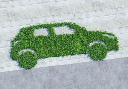 image of electric vehicle of geen leaves