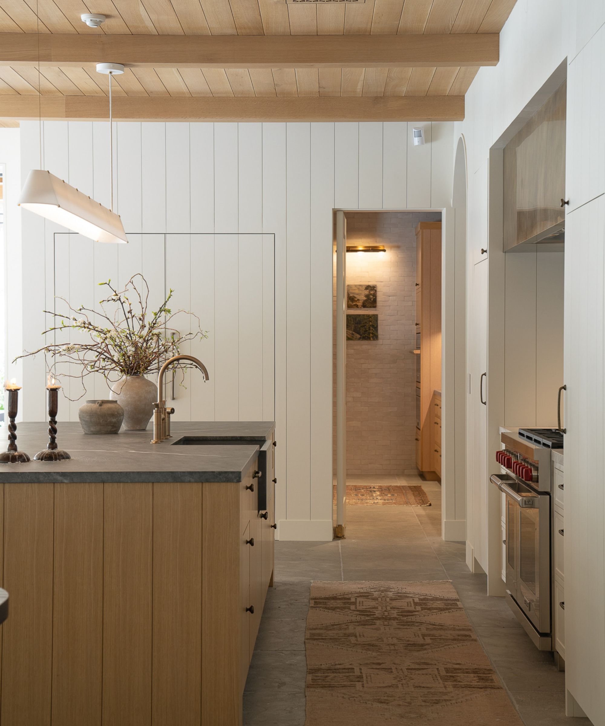 kitchen island with simple wooden cabinetry