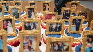 Cakes, decorated with picture frames featuring images of Britain's Prince William, Duke of Cambridge and Britain's Catherine, Duchess of Cambridge are picture during their visit to the Khidmat Centre in Bradford on January 15, 2020, where they to learned about the activities and workshops offered by the centre.