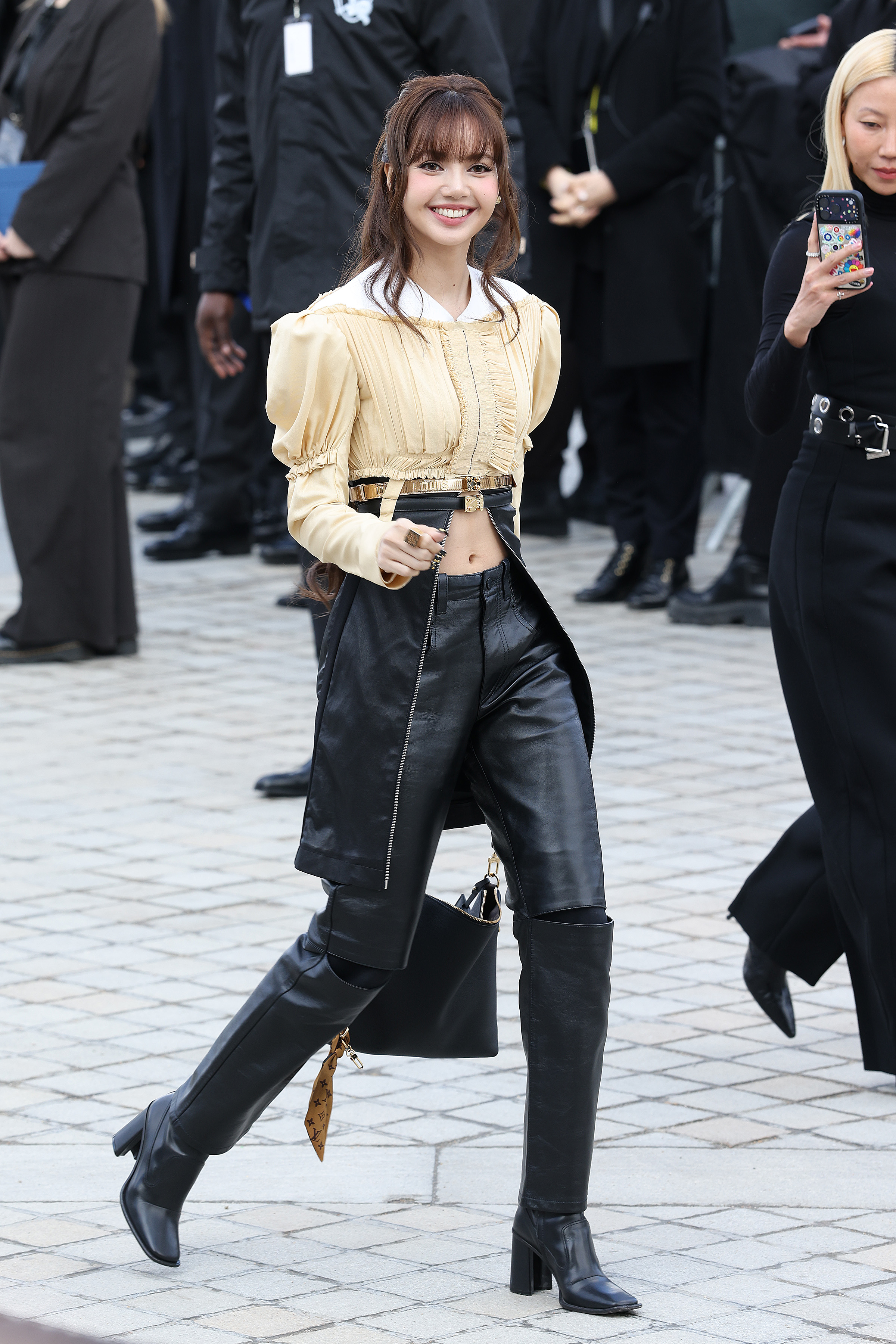Lisa of Blackpink wore puff sleeves at the Louis Vuitton Fall 2026 fashion show