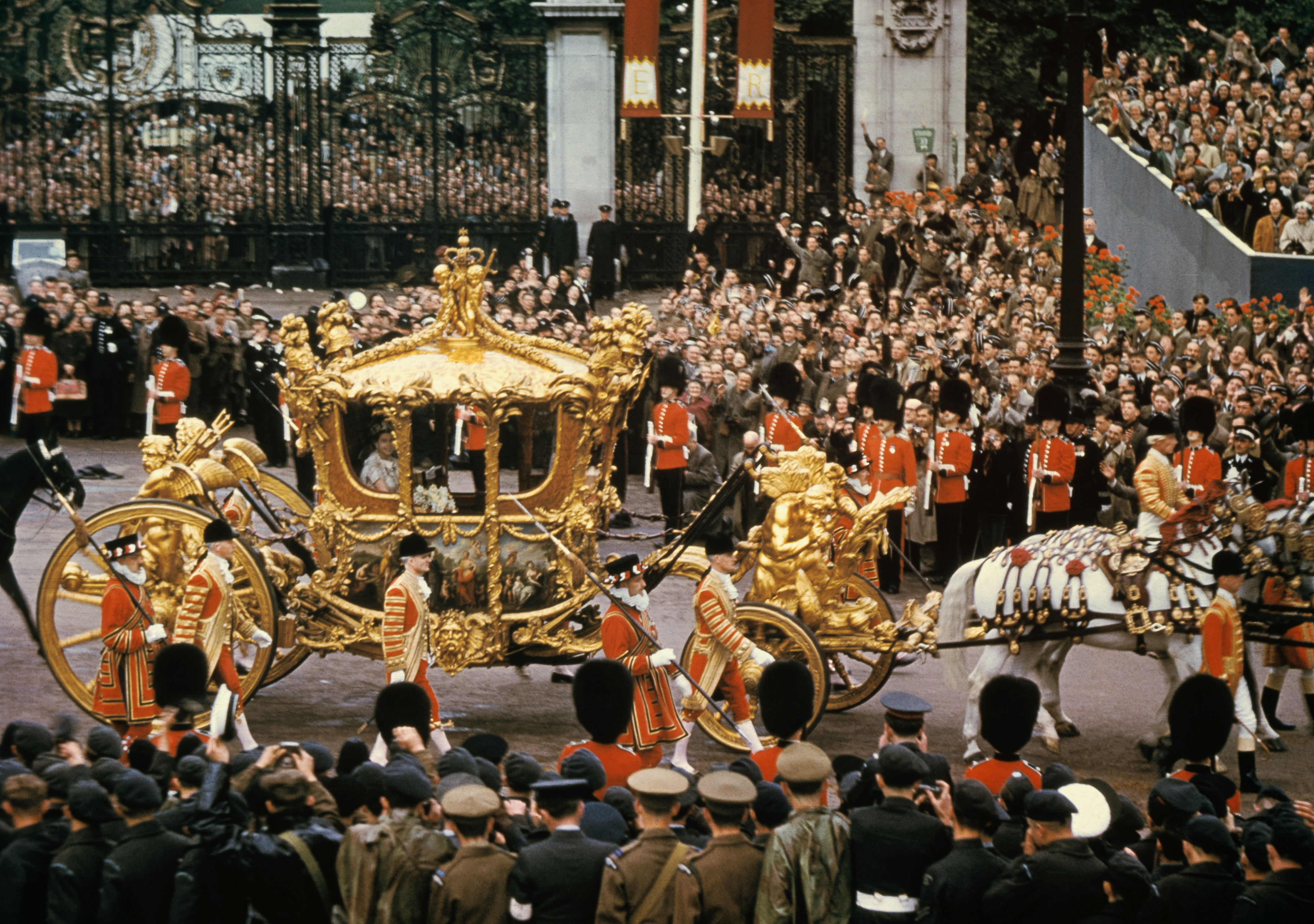 Queen Elizabeth rides in a gold carriage to her coronation on June 2, 1953