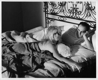 Brigitte Bardot lying in bed