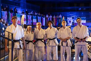 William Zabka as Johnny Lawrence, Mary Mouser as Samantha LaRusso, Tanner Buchanan as Robby Keene, Xolo Maridueña as Miguel Diaz, Jacob Bertrand as Eli 'Hawk' Moskowitz, Gianni DeCenzo as Demetri in Cobra Kai.