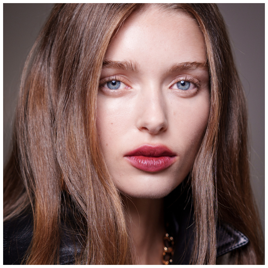 photo of model applying dry shampoo to hair
