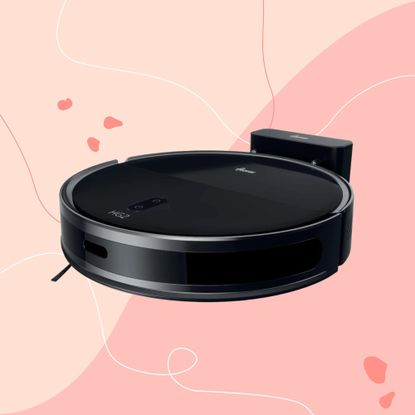 Hoover HG2 Turbo Slim Hydro Robot Vacuum Cleaner on a pink background