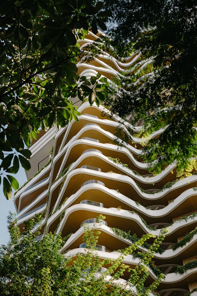 Park Nova, a tower with a vertical garden in Singapore, showing tropical greenery on balconies