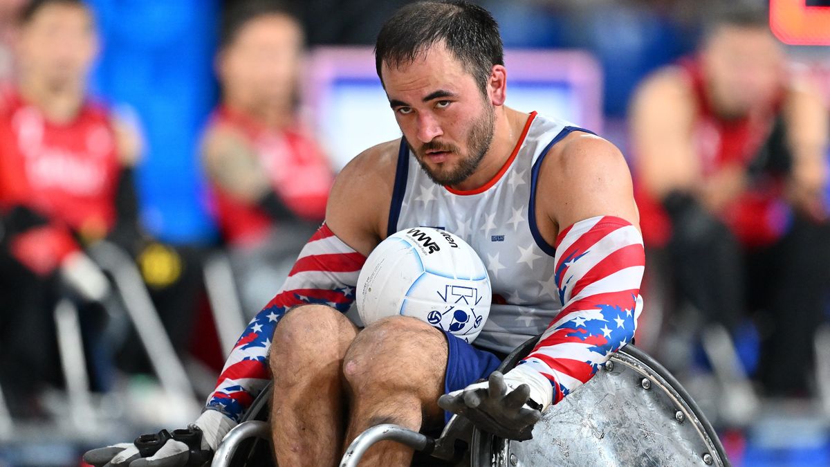 : Chuck Aoki of Team USA in action during the Wheelchair Rugby Group A game United States of America vs Canada on day one of the Paris 2024 Summer Paralympic Games at Champs-de-Mars Arena on August 29, 2024 in Paris, France.