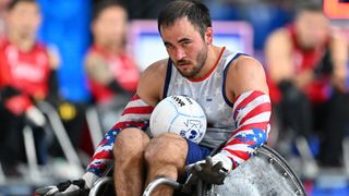 : Chuck Aoki of Team USA in action during the Wheelchair Rugby Group A game United States of America vs Canada on day one of the Paris 2024 Summer Paralympic Games at Champs-de-Mars Arena on August 29, 2024 in Paris, France.