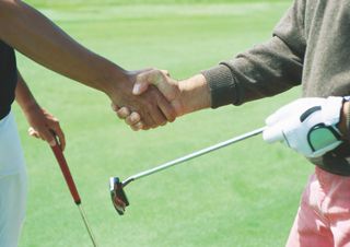 Golfers shaking hands