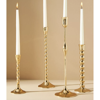 gold taper candle holder