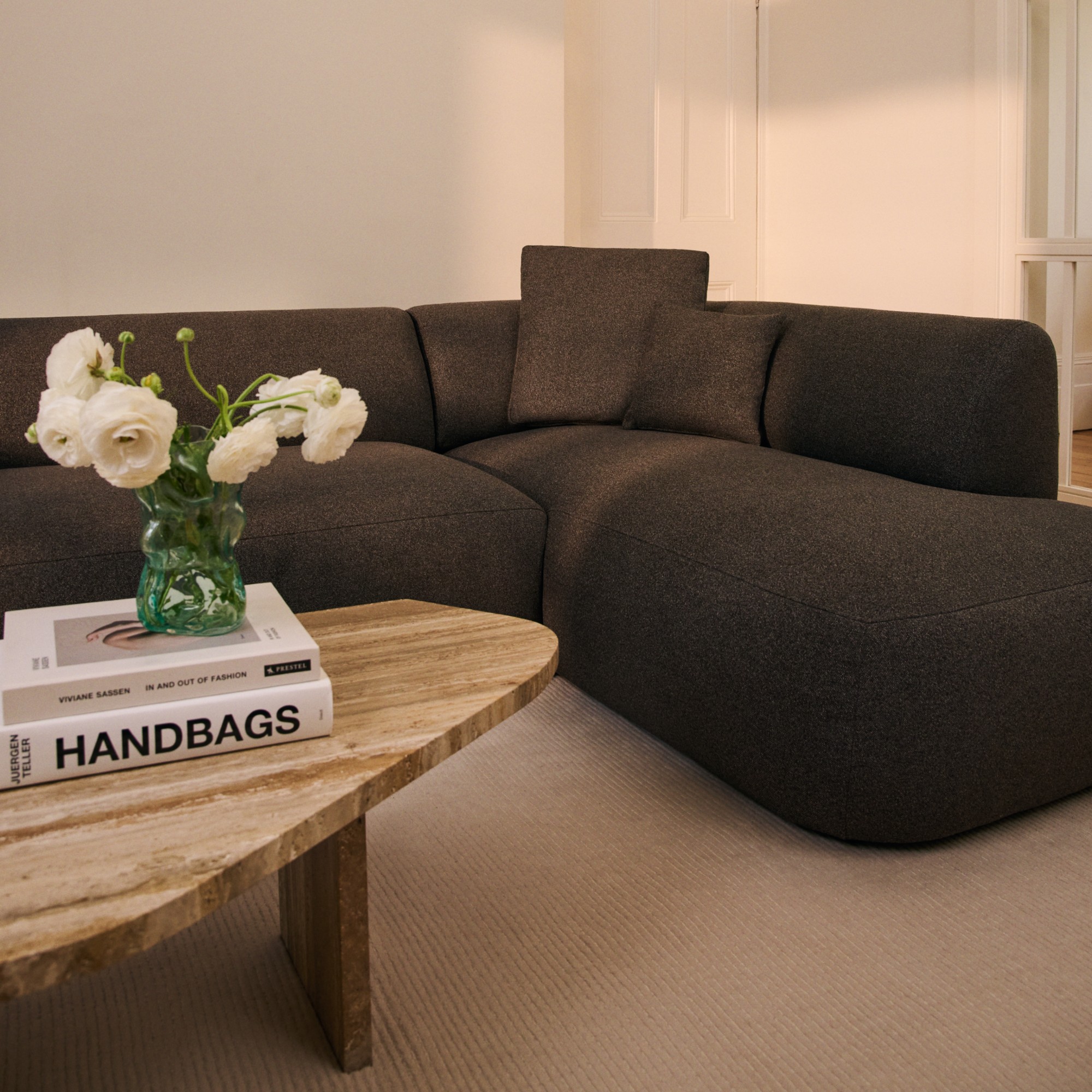 Sofa Club Hoxton sofa in a living room with a stone coffee table