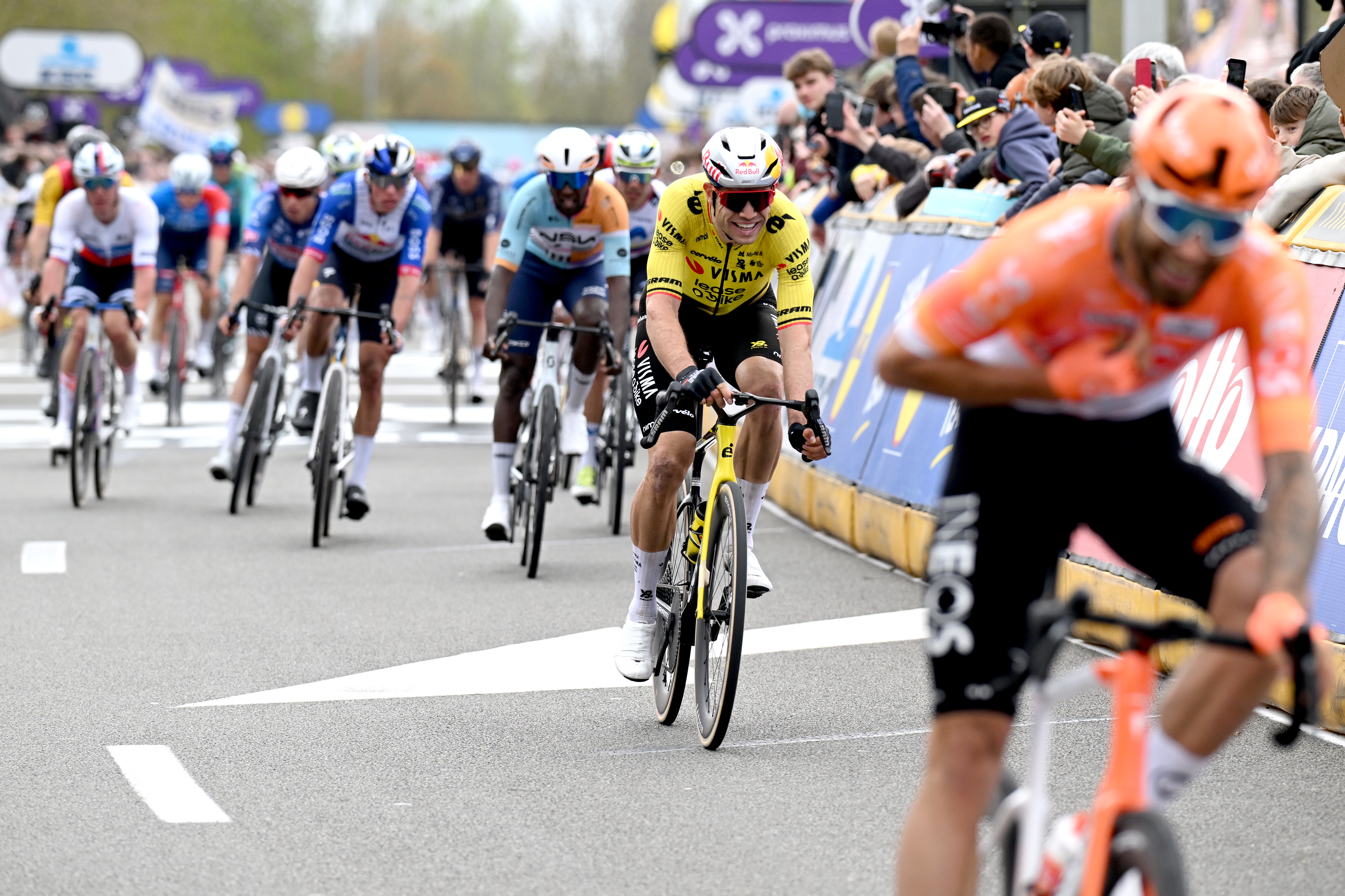 WAREGEM, BELGIUM - APRIL 01: Wout van Aert of Belgium and Team Visma | Lease a Bike crosses the finish line during the 80th Dwars Door Vlaanderen 2026 - Men&amp;apos;s Elite a 184.6km one day race from Roeselare to Waregem / #UCIWT / on April 01, 2026 in Waregem, Belgium. (Photo by Dario Belingheri/Getty Images)