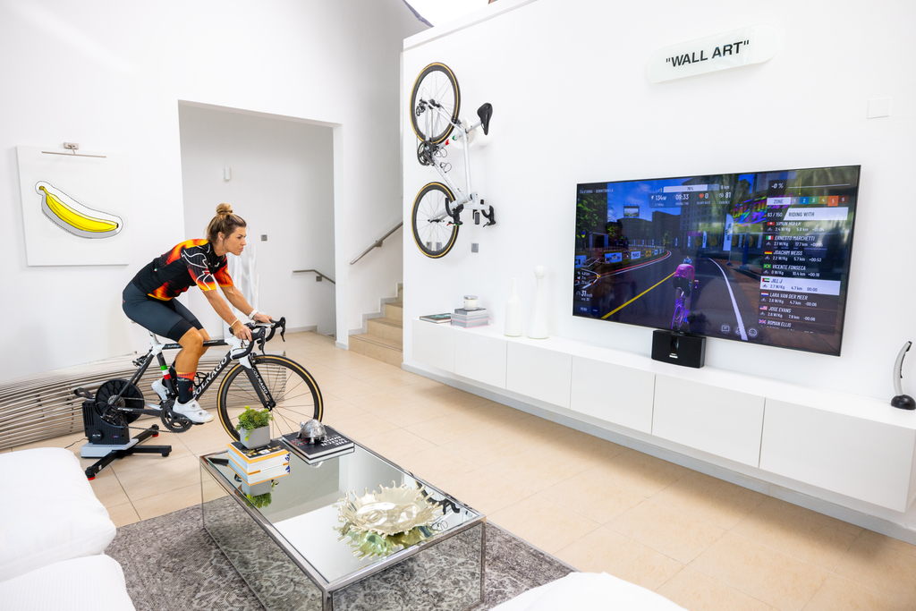 A rider using MyWhoosh indoors