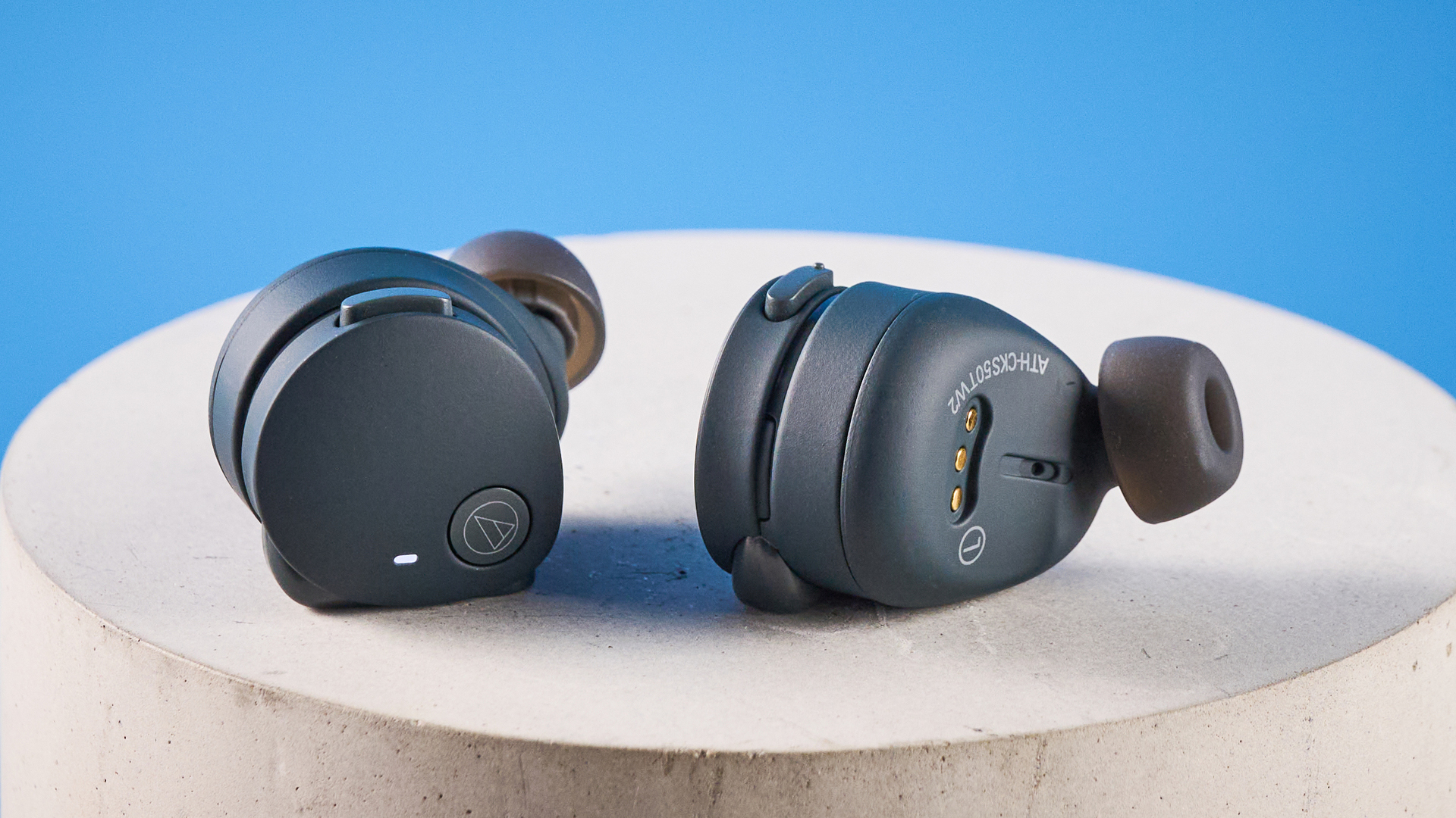 Audio-Technica ATH-CKS50TW2 in black colorway photographed ona blue background