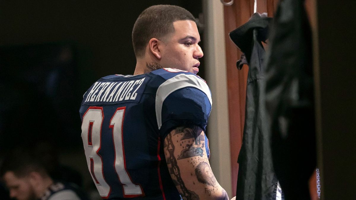 Aaron Hernandez stands in the New England Patriots locker room on American Sports Story