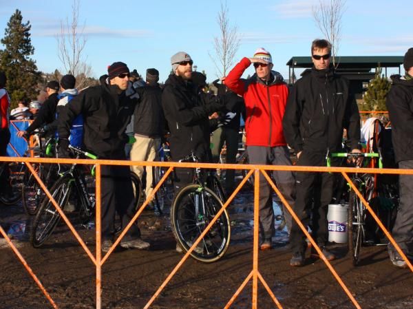 The Cannondale-Cyclocrossworld.com crew waiting with bikes in hand in case their riders decide to come through the pits.