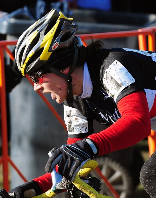 Andrea Smith (Minuteman Road Club) on the pavement with one to go.