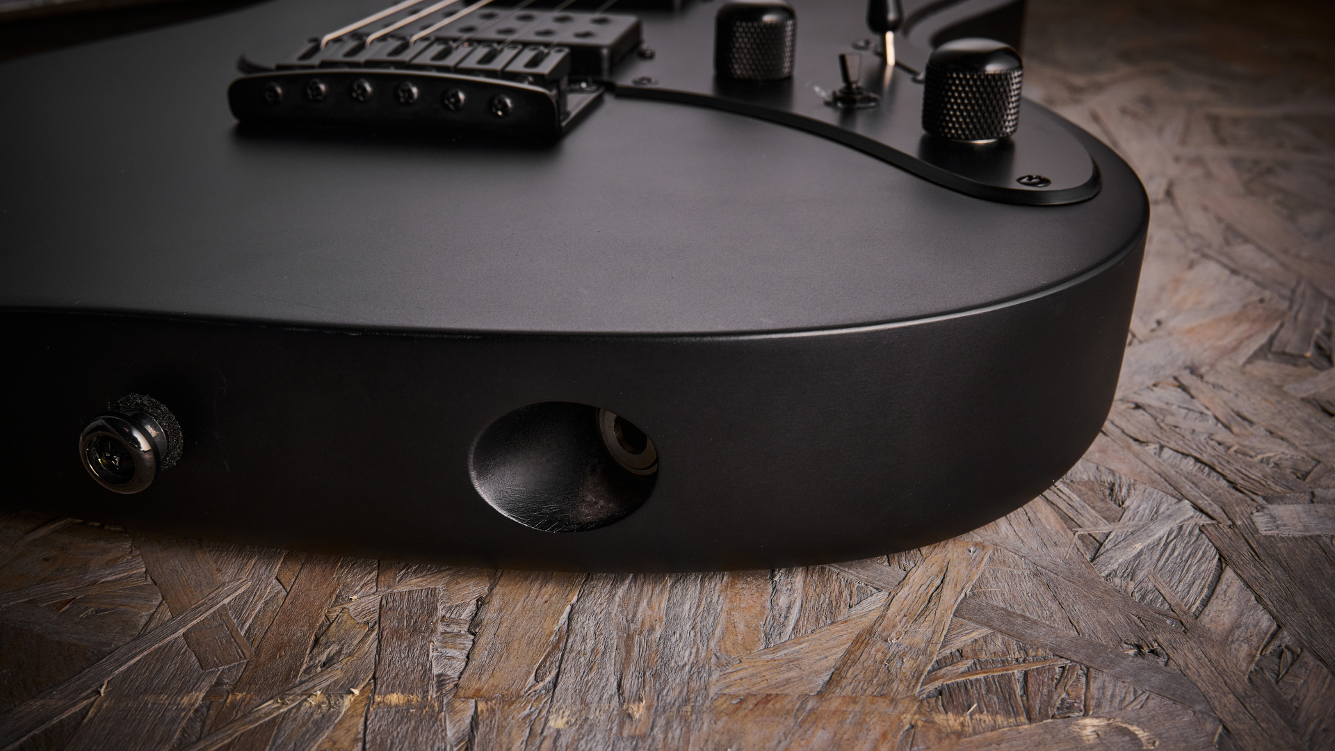 Close up of the output jack of the Ibanez Iron Label AZ41B1 electric guitar