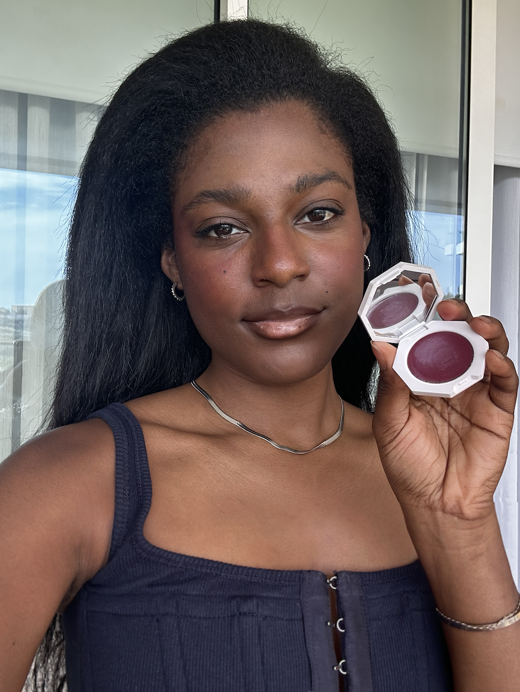 Shei Mamona wearing Fenty Beauty Blusher