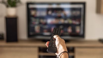 Remote control pointed at TV